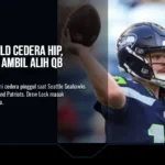 Quarterback Sam Darnold appeared to be limping after being driven into the ground. (AP Photo)